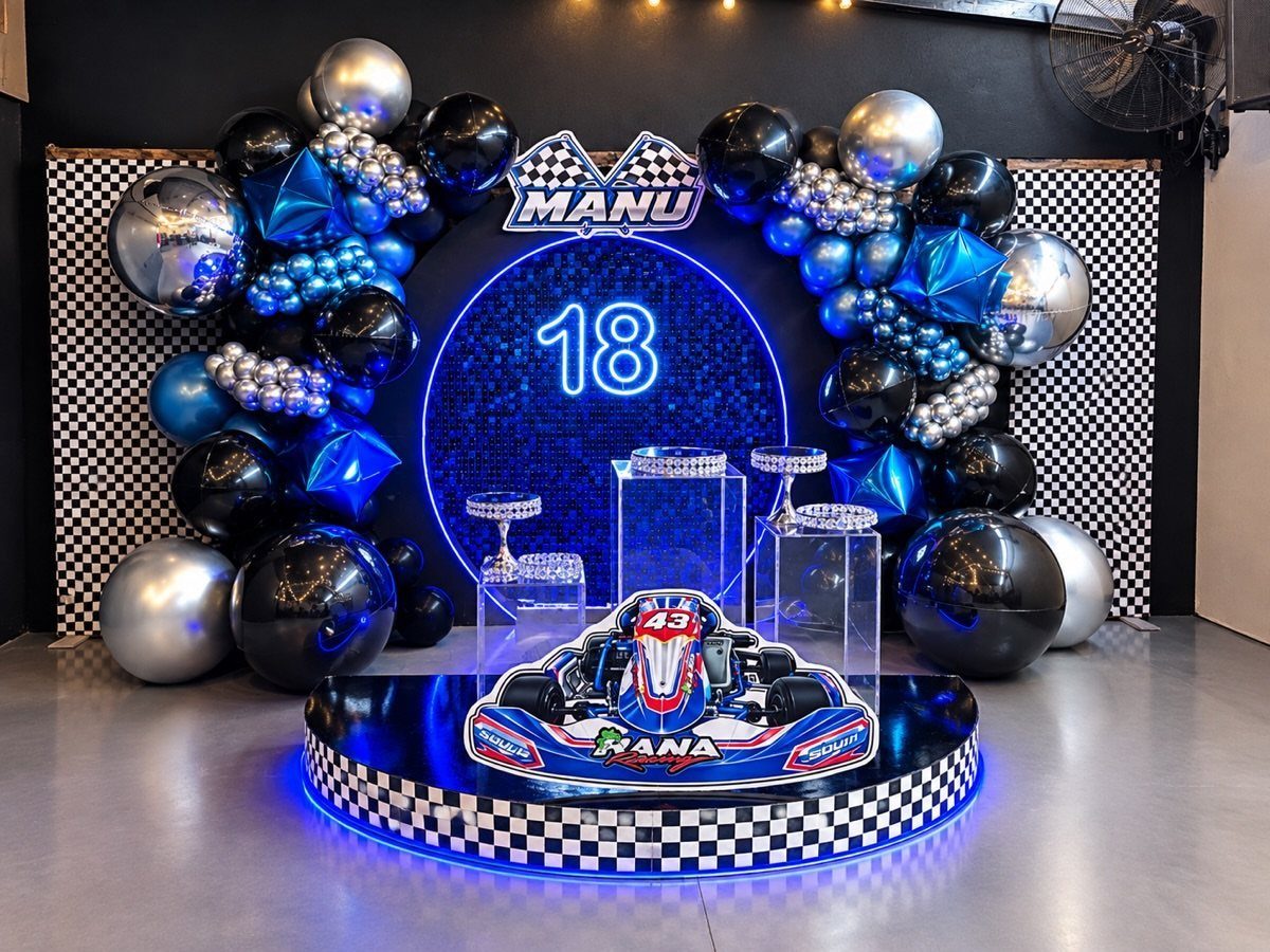 Racing themed 18th birthday decoration with blue balloons and a go-kart podium.