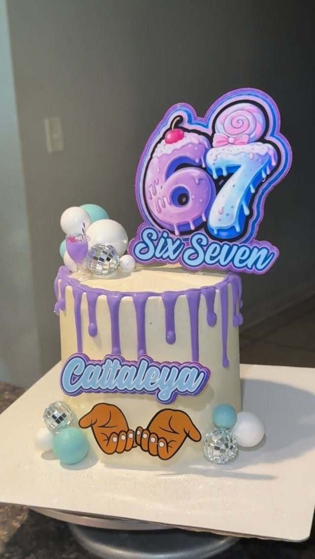 67 Cake Ideas for Birthdays: 14 Designs From Drip to Neon 12 White cake with purple drips and a stylized 67 topper and cartoon hands.