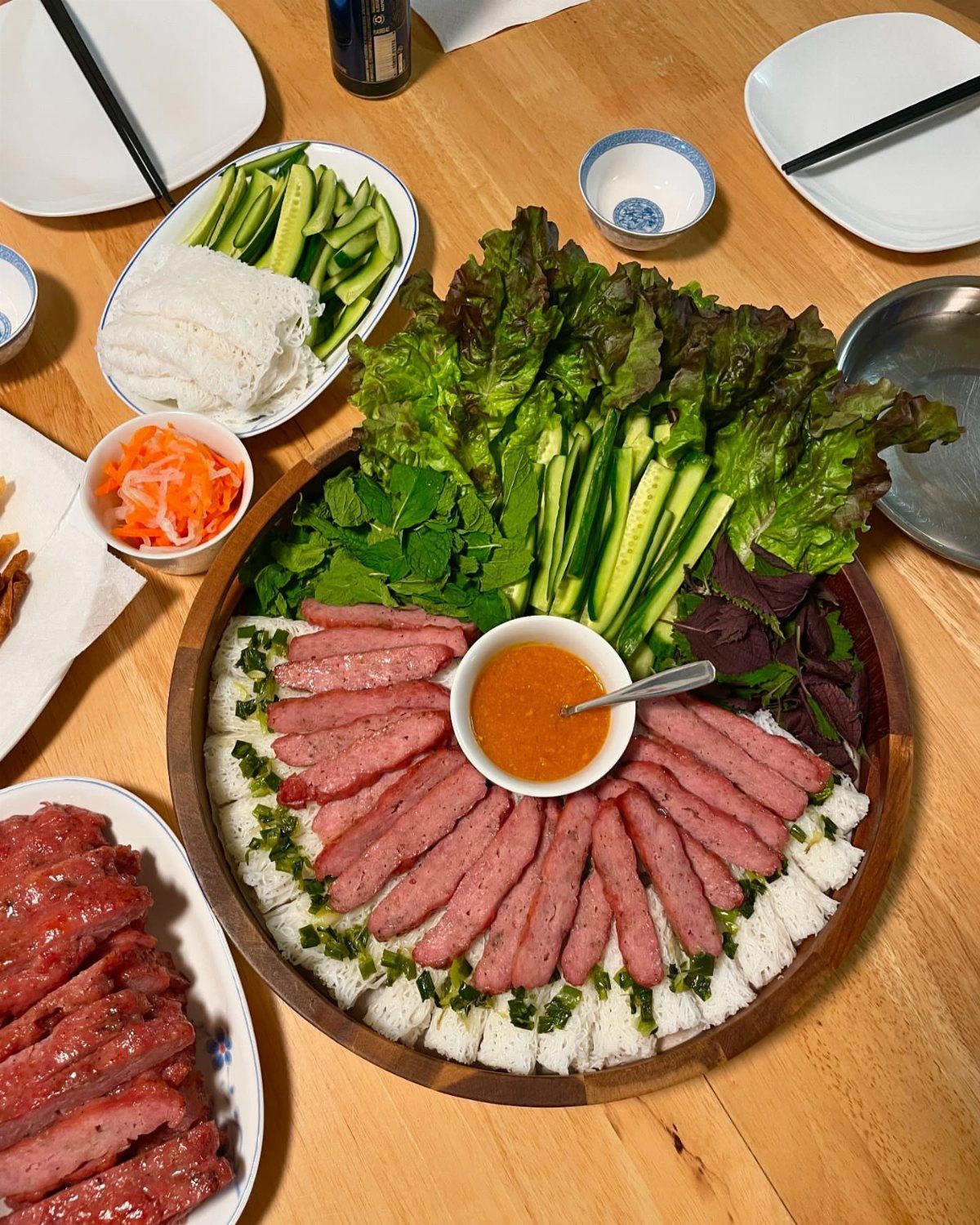 Charcuterie Board Table Ideas: 38 Grazing Tables and Platters 29 Banh hoi platter with rice noodles, sliced sausages, dipping sauce, and fresh greens.
