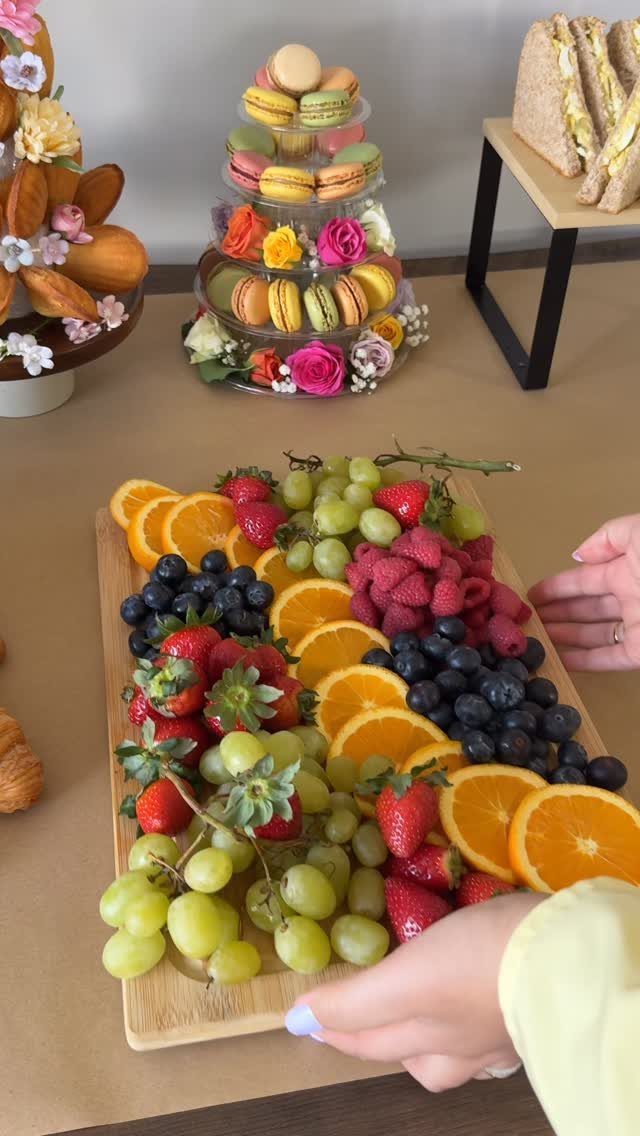 Charcuterie Board Table Ideas: 38 Grazing Tables and Platters 34 Fruit charcuterie board with oranges, grapes, strawberries, blueberries, and raspberries on wood.
