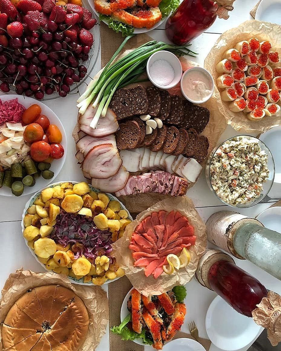 Charcuterie Board Table Ideas: 38 Grazing Tables and Platters 32 Russian charcuterie spread with rye bread, sliced meats, caviar blinis, and fresh berries.