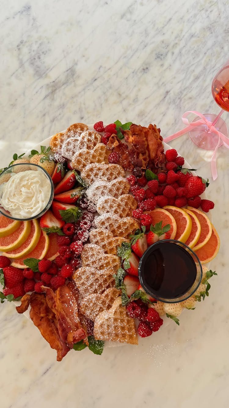 Charcuterie Board Table Ideas: 38 Grazing Tables and Platters 22 Waffle breakfast board with fresh berries, grapefruit, bacon, whipped cream, and maple syrup.