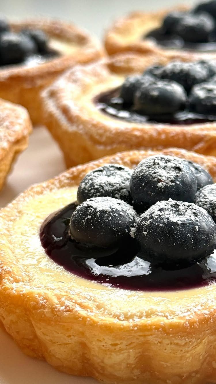 24 Desserts to Make with Blueberries, Cobbler to Cheesecake 9 Mini blueberry tartlets with golden crusts, fresh blueberries, and a dusting of powdered sugar.