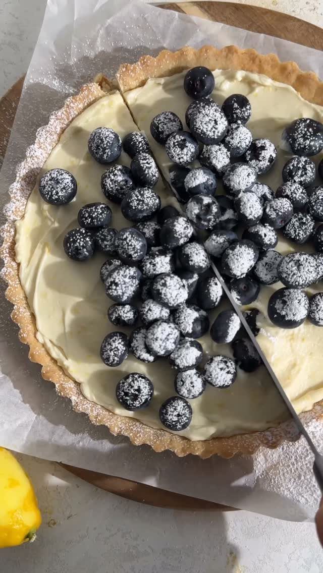24 Desserts to Make with Blueberries, Cobbler to Cheesecake 8 Lemon blueberry tart with powdered sugar berries and a slice of lemon.