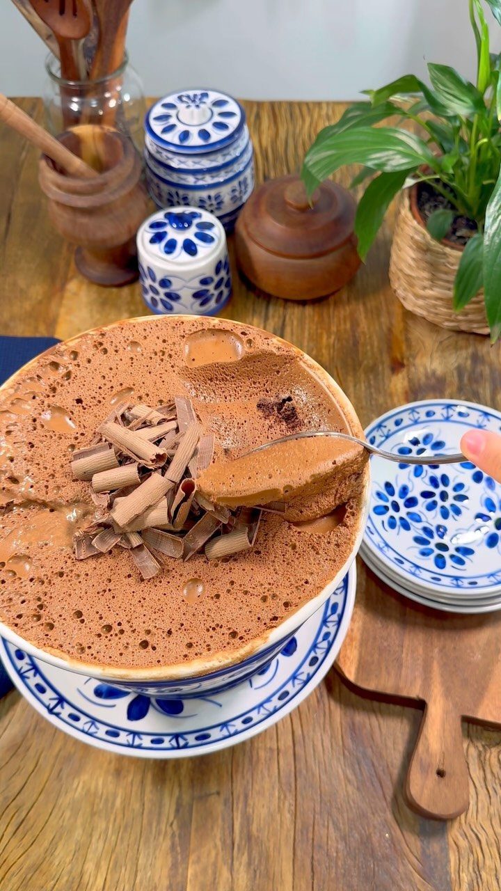27 Easy Sweet Treats No Bake Ideas, From Fudge to Eton Mess 20 Chocolate mousse with chocolate shavings in a blue and white patterned bowl.