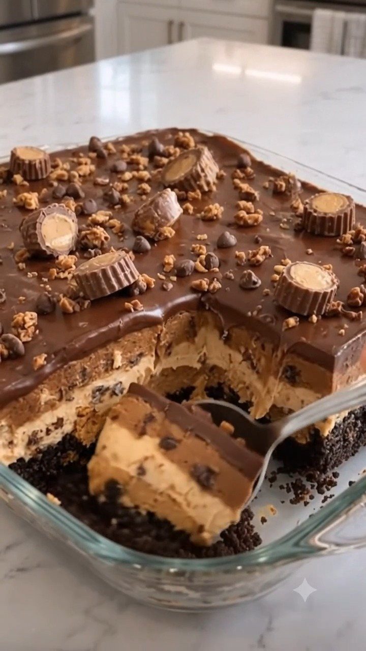 27 Easy Sweet Treats No Bake Ideas, From Fudge to Eton Mess 21 Layered chocolate and peanut butter dessert topped with mini peanut butter cups.
