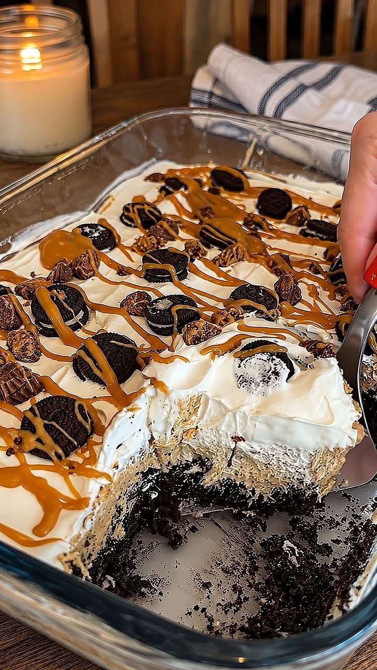 27 Easy Sweet Treats No Bake Ideas, From Fudge to Eton Mess 12 Layered Oreo pie with whipped cream and caramel drizzle in a glass dish
