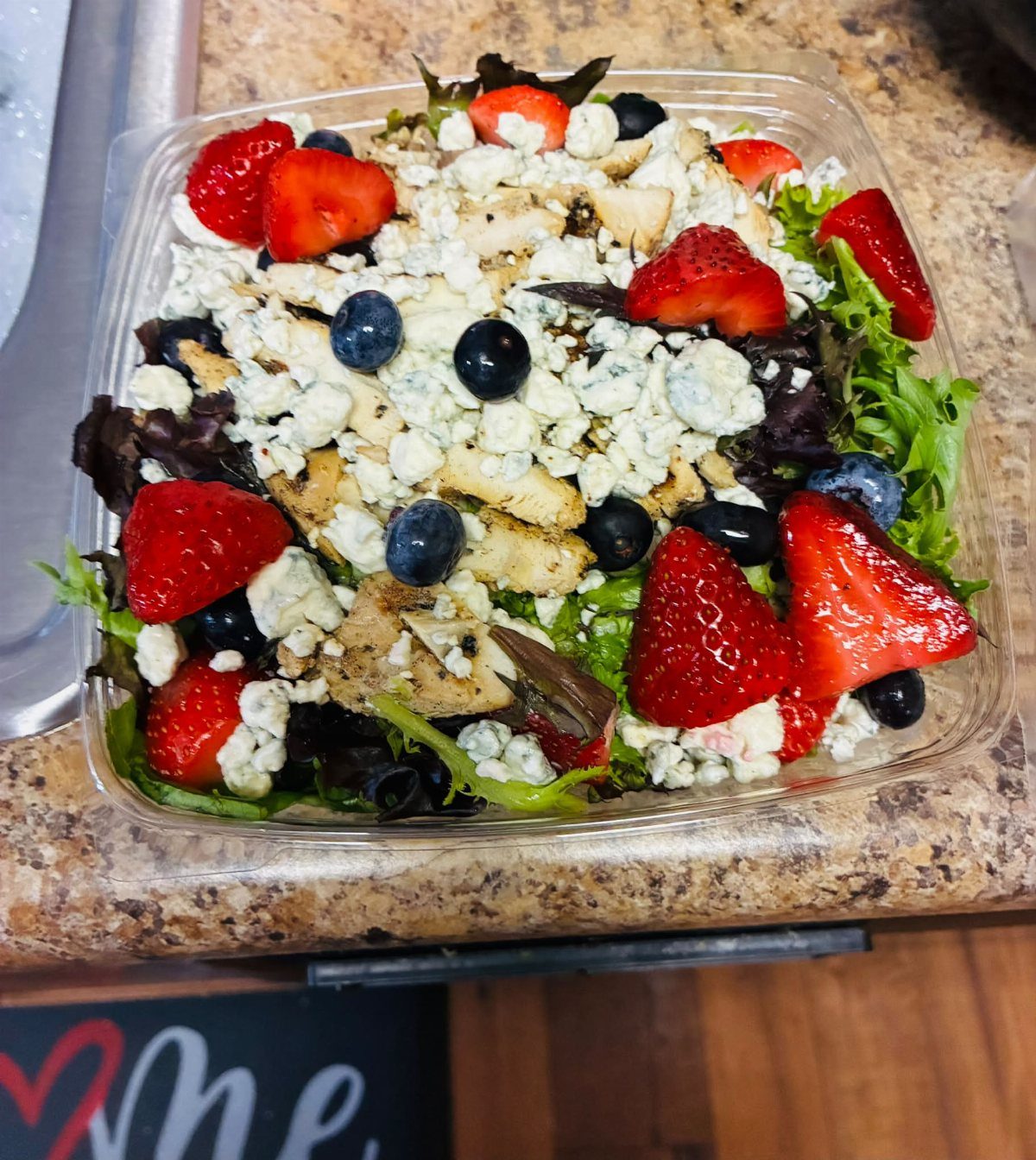 40 Food Lunch Recipes You Can Make in Minutes 13 Grilled chicken salad with strawberries, blueberries, and blue cheese in a plastic container.