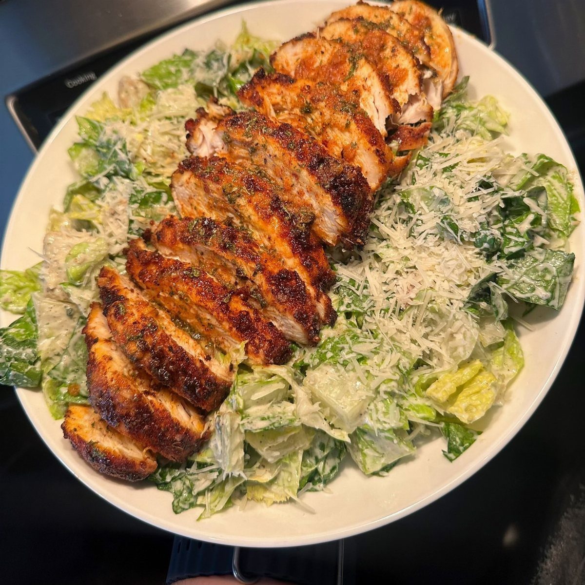 40 Food Lunch Recipes You Can Make in Minutes 31 Grilled sliced chicken breast on a Caesar salad with parmesan cheese in a bowl