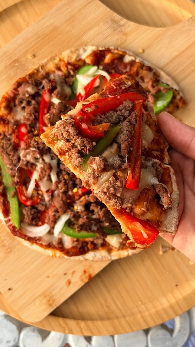 40 Food Lunch Recipes You Can Make in Minutes 30 Mexican-style pizza with ground meat and peppers on a wooden cutting board
