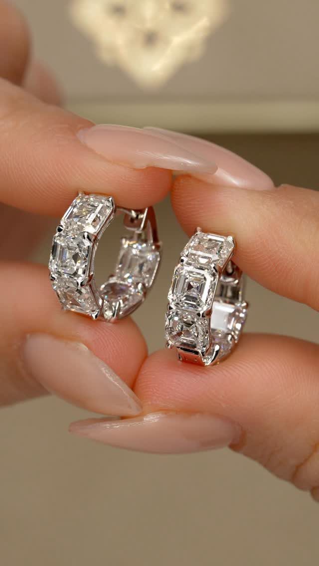 38 Gift Ideas for 13th Birthday in 2026, From Snoopy to LEGO 35 Silver hoop earrings with rectangular clear gemstones held by manicured fingers.