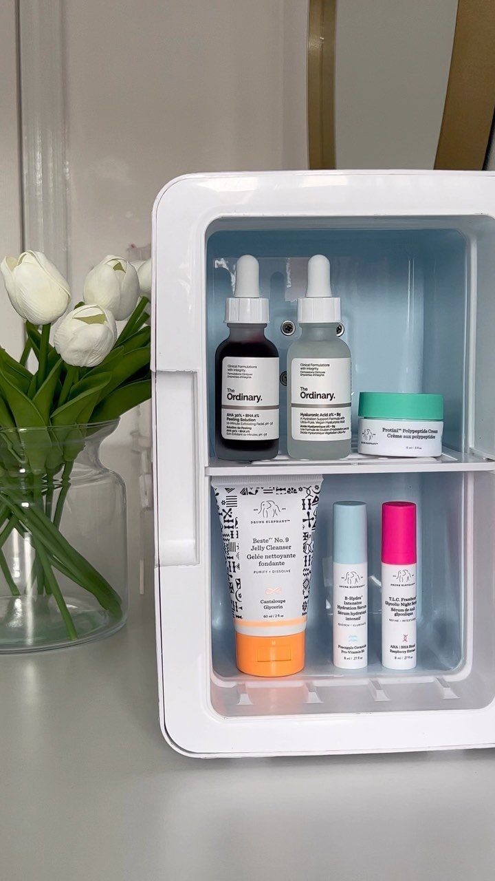 38 Gift Ideas for 13th Birthday in 2026, From Snoopy to LEGO 11 Small white beauty fridge open and filled with various skincare serums and creams.