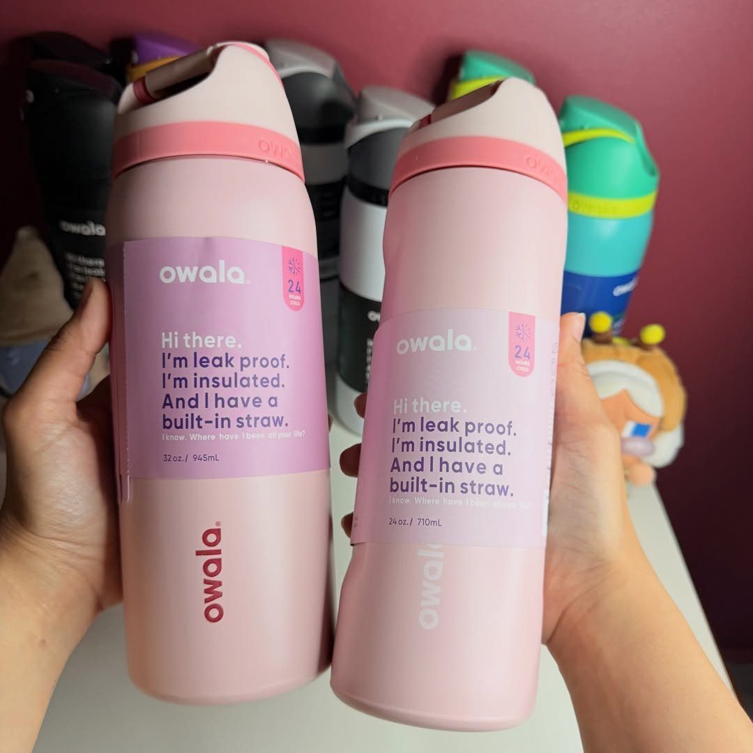 38 Gift Ideas for 13th Birthday in 2026, From Snoopy to LEGO 7 Two pink Owala insulated water bottles with labels held by two hands.