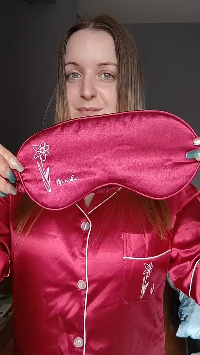 38 Gift Ideas for 13th Birthday in 2026, From Snoopy to LEGO 17 Young woman wearing magenta satin pyjamas and holding a matching satin sleep mask.