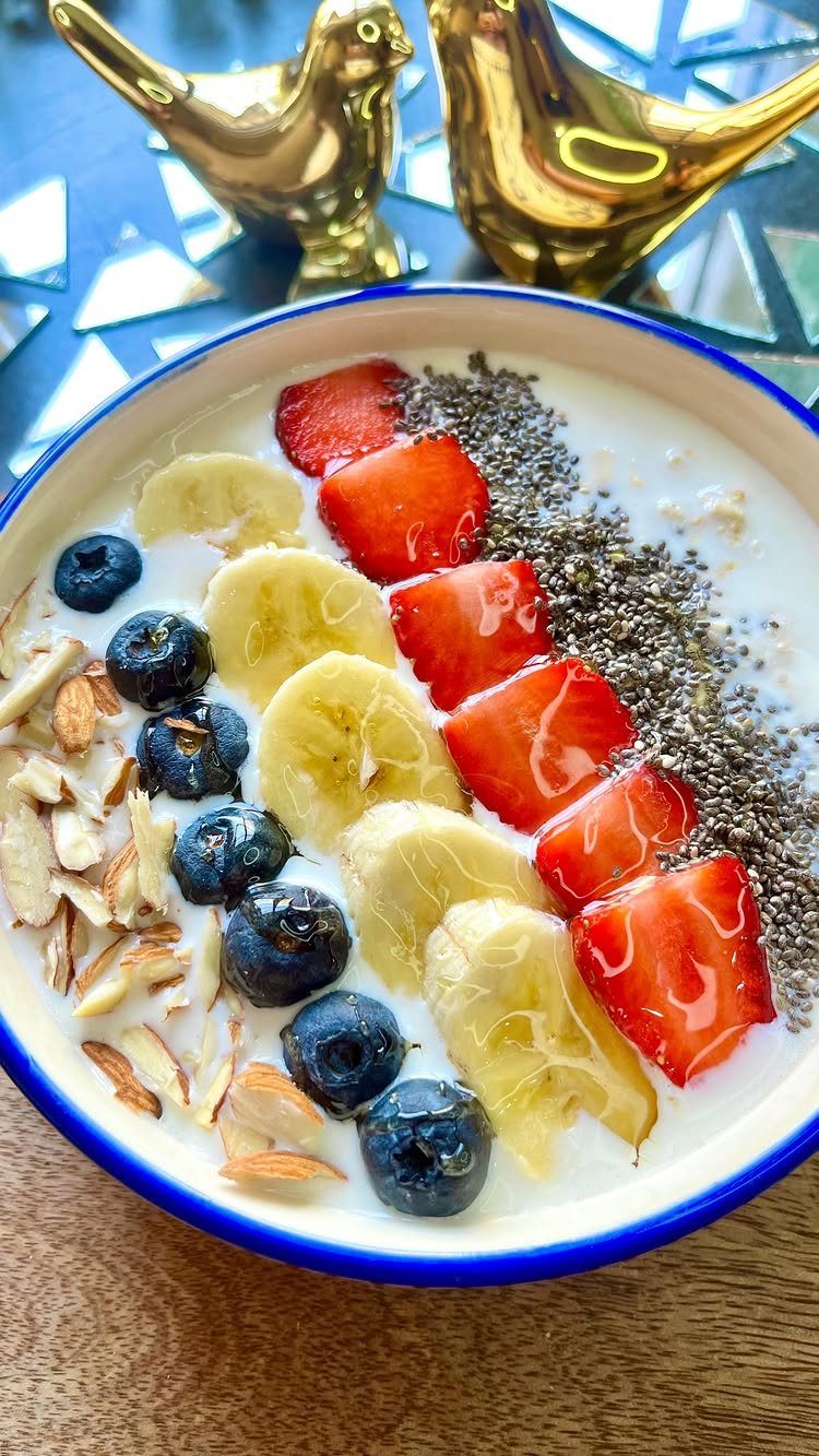 16 Morning Healthy Breakfast Ideas, From Egg Bites to Oats 13 Chia pudding bowl topped with strawberries, bananas, blueberries, and slivered almonds.