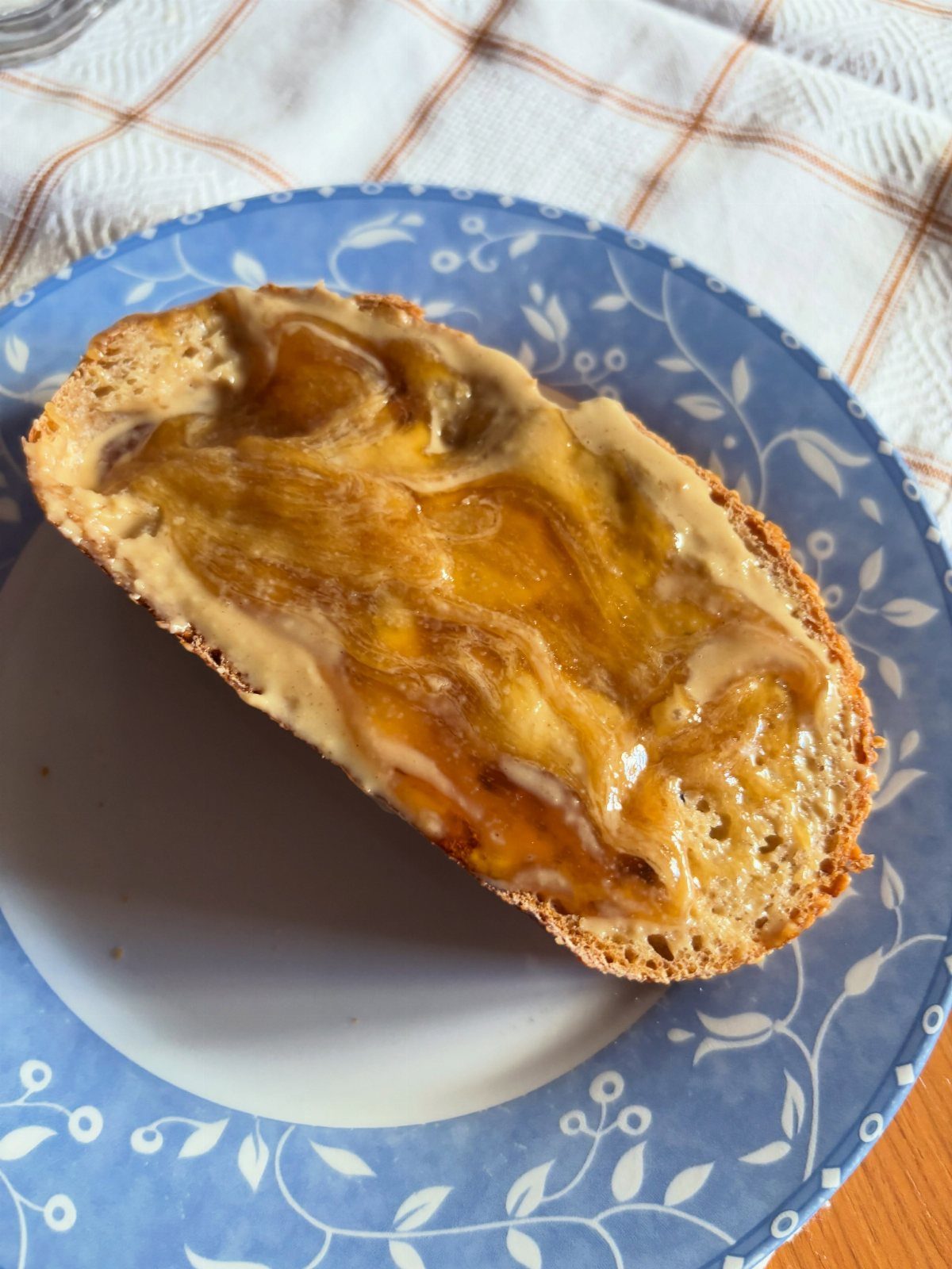 16 Morning Healthy Breakfast Ideas, From Egg Bites to Oats 14 Whole-grain toast with butter and jam on a blue floral plate.