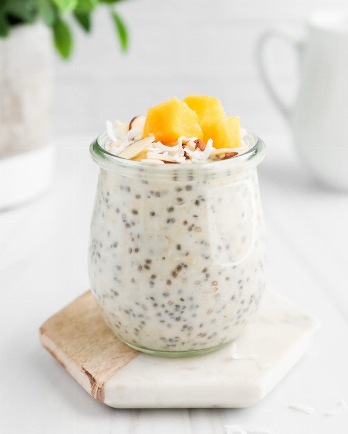 26 Oats Recipes for Snacks, from Energy Bites to Oat Crackers 24 Overnight oats with chia seeds topped with mango and coconut in a glass jar.