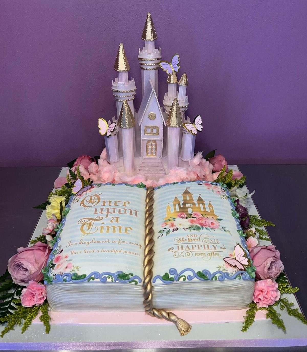 13 Open Book Cakes, from Fairytale Pages to Library Shelves 4 Open book cake with a 3D fairytale castle and pink roses on base