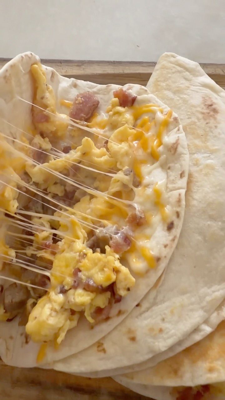 32 Ideas on What to Serve for Breakfast, From Eggs to Scones 10 Breakfast tacos filled with scrambled eggs, melted cheese, and crispy bacon bits.